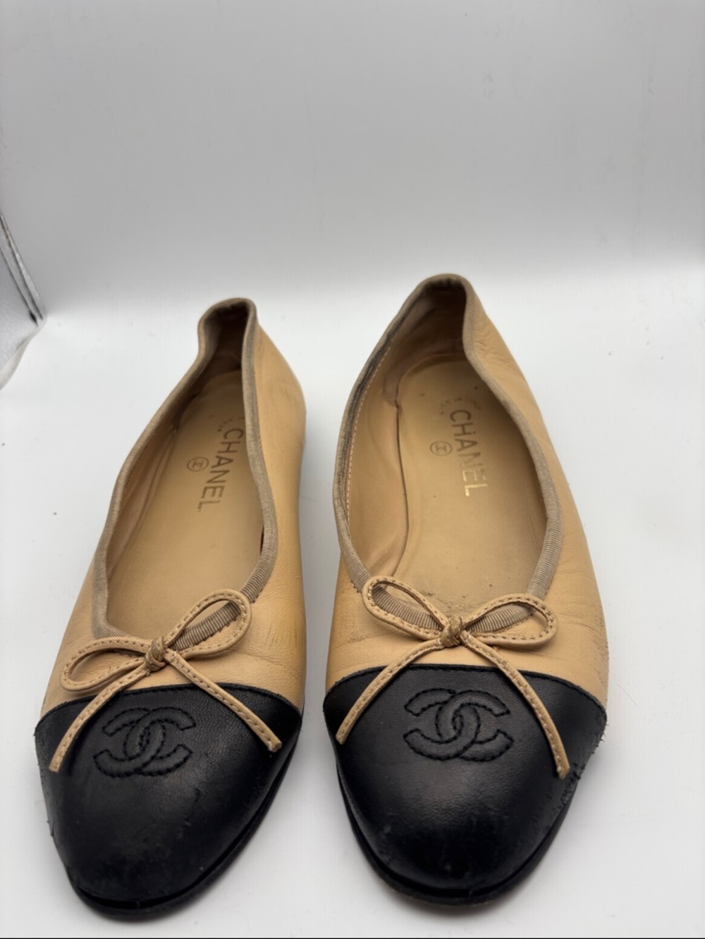 CHANEL Beige Leather Ballet Flats with Black Cap Toe